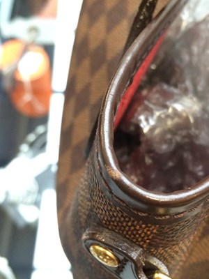 Lot 1047 - A Louis Vuitton Neverfull Damier Check Bag...