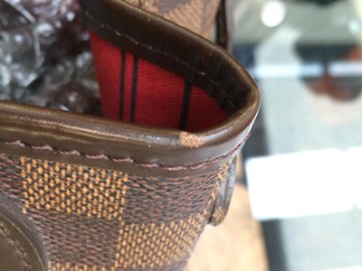 Lot 1047 - A Louis Vuitton Neverfull Damier Check Bag...