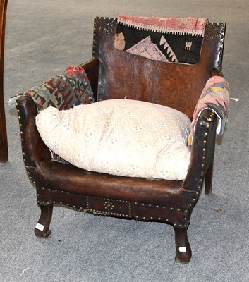 Lot 493 - An Armchair, with tooled and brass studded...