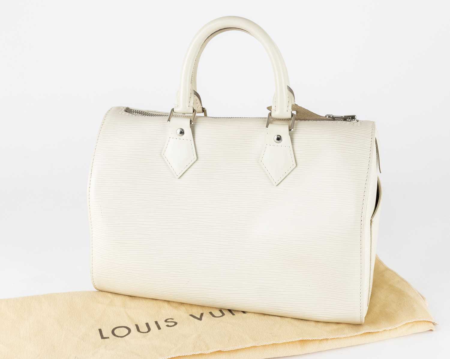 Lot 1031 - Louis Vuitton Cream Epi Leather Speedy Bag,...