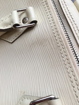 Lot 1031 - Louis Vuitton Cream Epi Leather Speedy Bag,...