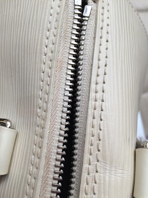 Lot 1031 - Louis Vuitton Cream Epi Leather Speedy Bag,...