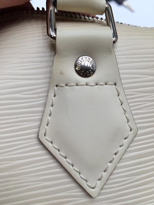 Lot 1031 - Louis Vuitton Cream Epi Leather Speedy Bag,...