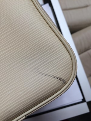 Lot 1031 - Louis Vuitton Cream Epi Leather Speedy Bag,...