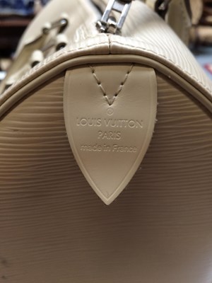 Lot 1031 - Louis Vuitton Cream Epi Leather Speedy Bag,...