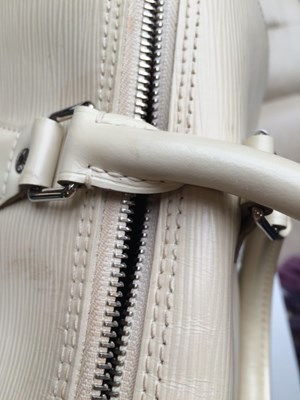 Lot 1031 - Louis Vuitton Cream Epi Leather Speedy Bag,...