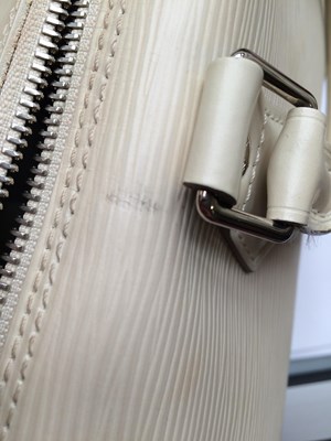 Lot 1031 - Louis Vuitton Cream Epi Leather Speedy Bag,...