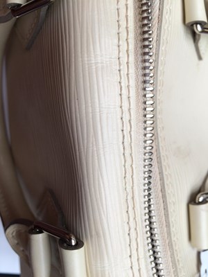Lot 1031 - Louis Vuitton Cream Epi Leather Speedy Bag,...