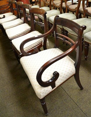 Lot 506 - Four rosewood bar-back dining chairs and two mahogany carvers upholstered to match