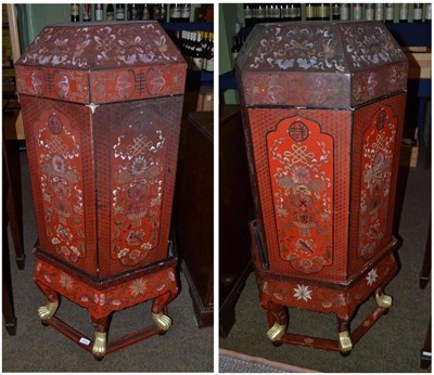 Lot 545 - Pair of Oriental red and polychrome painted stands, circa 1950, height 117cm