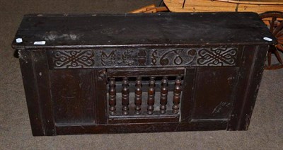 Lot 549 - Oak hanging cupboard with carved frieze 'N.C. 1689'