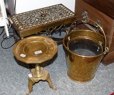 Lot 453 - A George III Brass and Steel Footman, with...