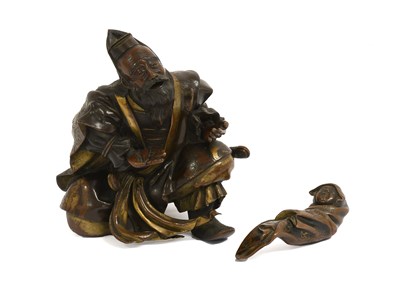 Lot 120 - A Japanese Gilt and Patinated Bronze Figure of...