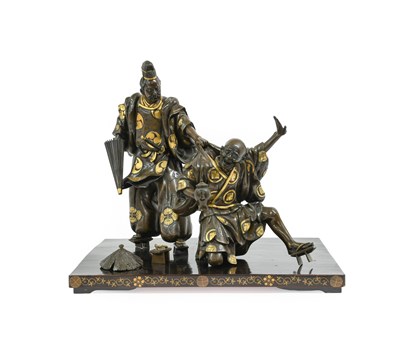 Lot 121 - A Japanese Gilt and Patinated Bronze Okimono,...