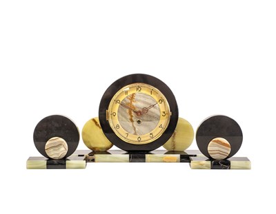 Lot 621 - An Art Deco French Marble and Onyx Mantel...