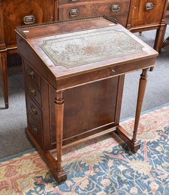 Lot 524 - A Yew Wood Davenport with green leather inset...