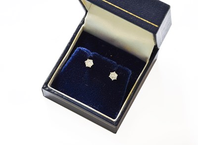 Lot 301 - A Pair of Diamond Solitaire Earrings, the...