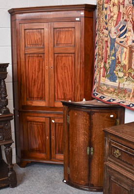Lot 502 - A Regency Mahogany Panel Fronted Standing...