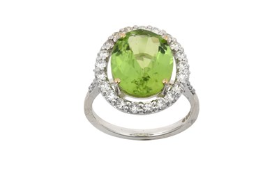 Lot 2357 - An 18 Carat White Gold Peridot and Diamond...