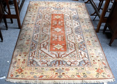 Lot 449 - Melas Rug, the narrow terracotta field framed...