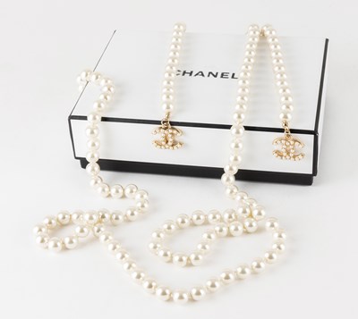 Lot Chanel, A Faux Pearl Lariat Necklace with Two...
