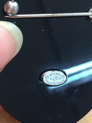 Lot 1073 - Chanel, A Faux Pearl Chain With Double Pin...