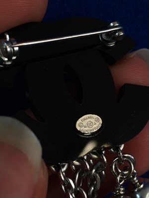 Lot 1073 - Chanel, A Faux Pearl Chain With Double Pin...