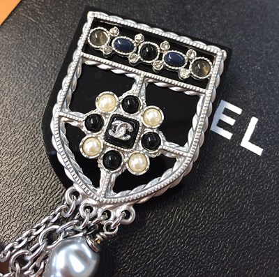 Lot 1073 - Chanel, A Faux Pearl Chain With Double Pin...