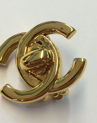 Lot 1074 - Chanel, A Pair of Vintage CC Turnlock Clip-On...