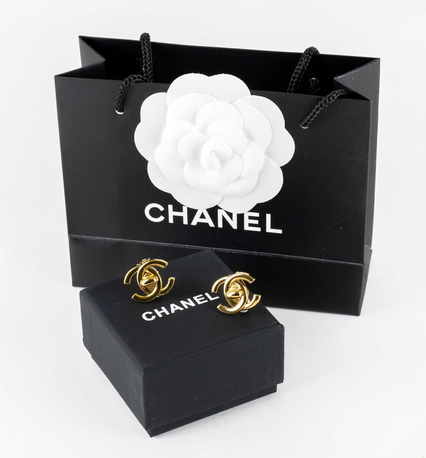 Lot 1074 - Chanel, A Pair of Vintage CC Turnlock Clip-On...