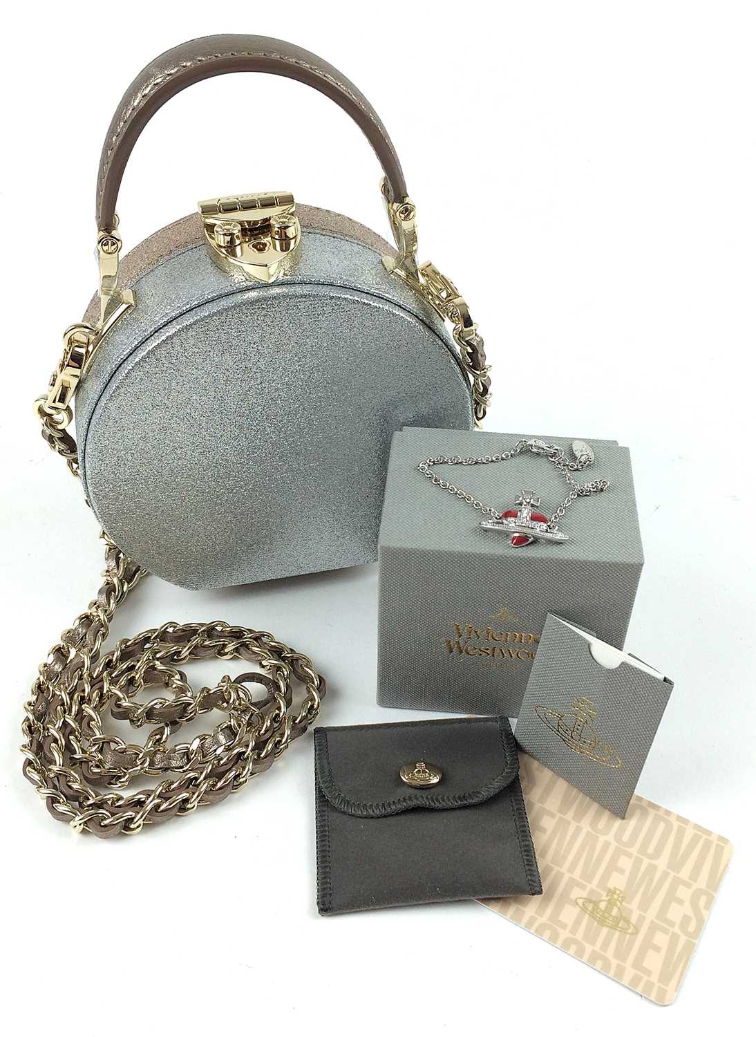 Lot 1078 - Vivienne Westwood Red Heart Orb Bracelet,...