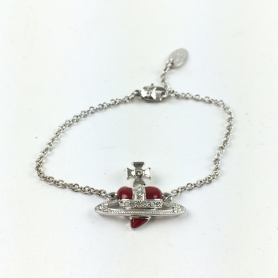 Lot 1078 - Vivienne Westwood Red Heart Orb Bracelet,...