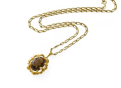 Lot 308 - A 9 Carat Gold Smoky Quartz Pendant on Chain,...