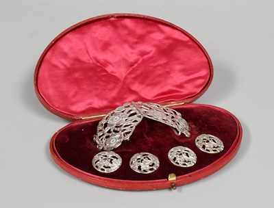 Lot 53 - A Cased Set of Silver Buttons and a Buckle,...