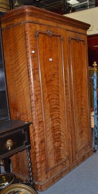 Lot 626 - A Victorian satinwood double door wardrobe, with carved detail to each door (a.f.)