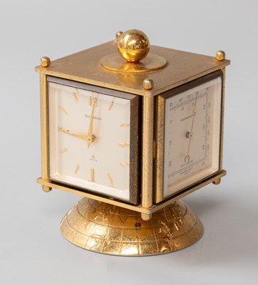 Lot 148 - A Gilt Metal Revolving Desk Compendium,...