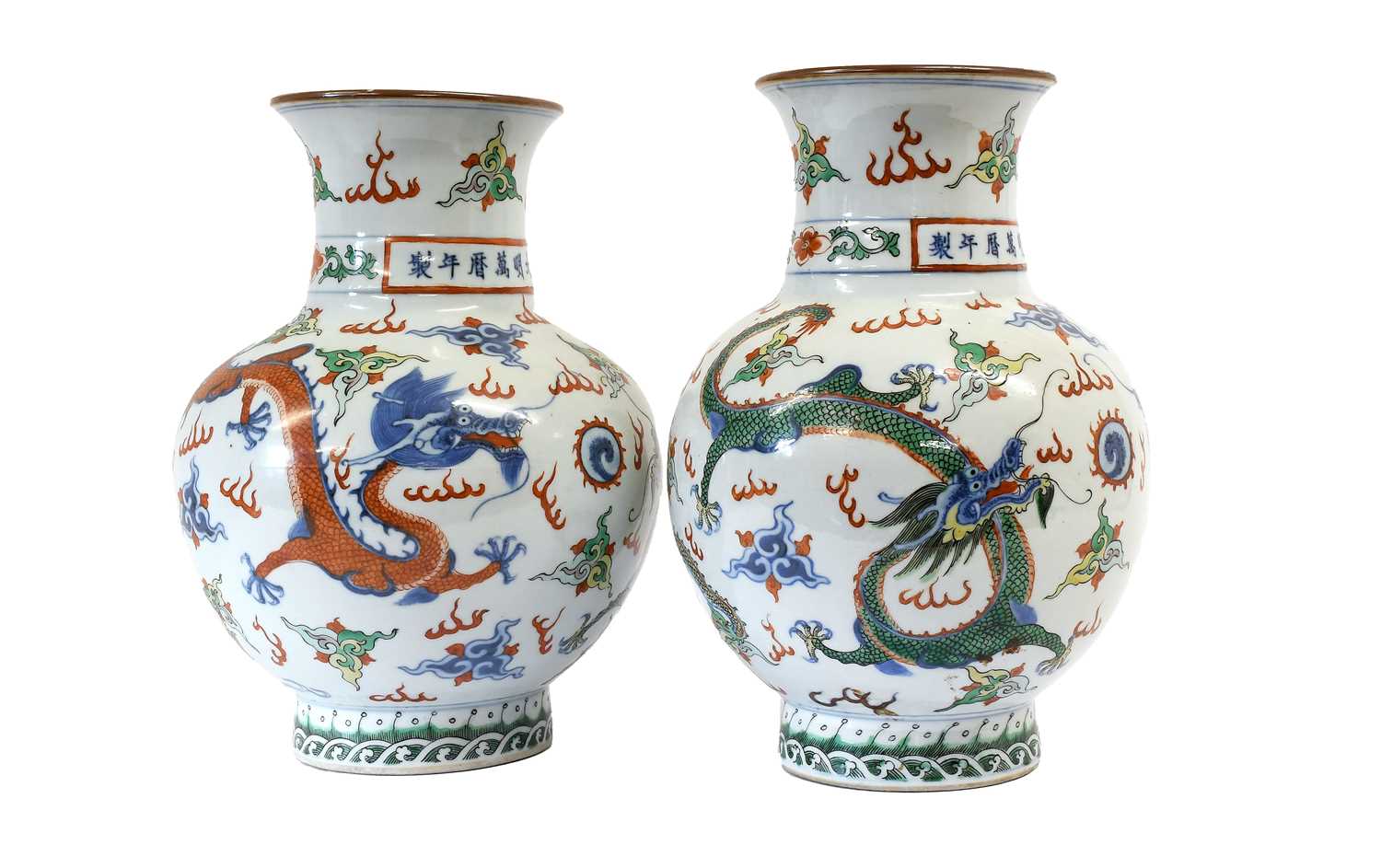 Lot 61 - A Pair of Chinese Wucai Porcelain Vases, Wanli...