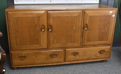 Lot 630 - Ercol Light Elm Side Cabinet, 130cm by 43cm by...
