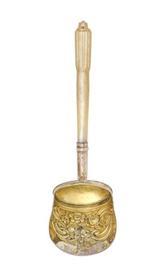 Lot 2041 - A George III Silver-Gilt and Mother-of-Pearl Caddy-Spoon
