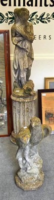 Lot 676 - A composite garden eagle ornament and a figure on a column base