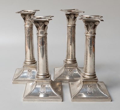 Lot 21 - A Set of Four George V Silver Candlesticks, by...
