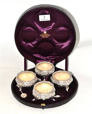 Lot 2 - Four Victorian silver salts and spoons, cased