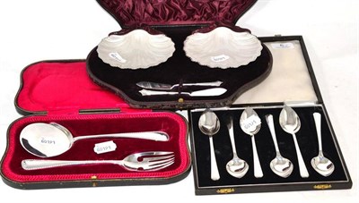 Lot 6 - A pair of silver butter dishes, six grapefruit spoons and a pair of servers, cased