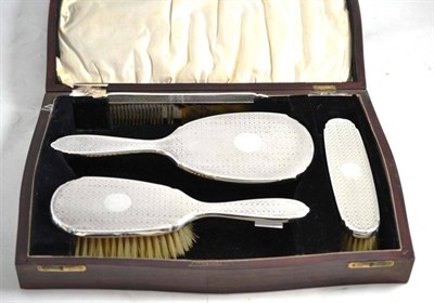 Lot 8 - A silver brush and mirror set, cased