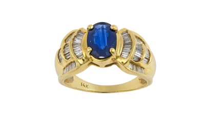 Lot 2237 - A Sapphire and Diamond Ring the oval cut...