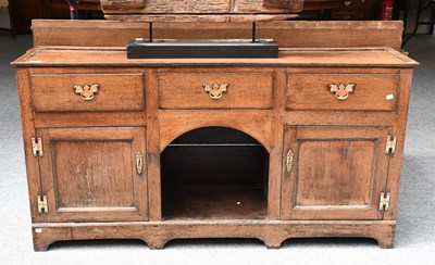 Lot 605 - An 18th Century Oak Dresser Base, with three...