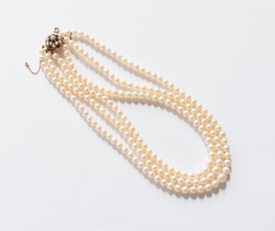Lot 317 - A Triple Row Cultured Pearl Necklace, with A...