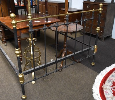 Lot 568 - A Victorian Brass and Balck painted Metal...