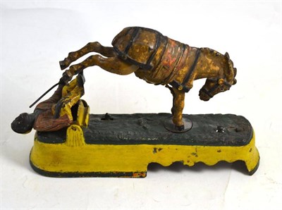 Lot 36 - A bucking mule cast iron money bank, re-painted ";Always Did Despise the Mule"