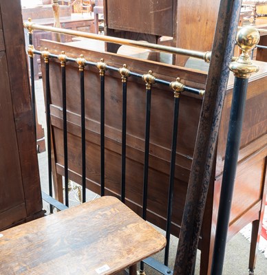Lot 506 - A Victorian Brass and Black Painted Metal...